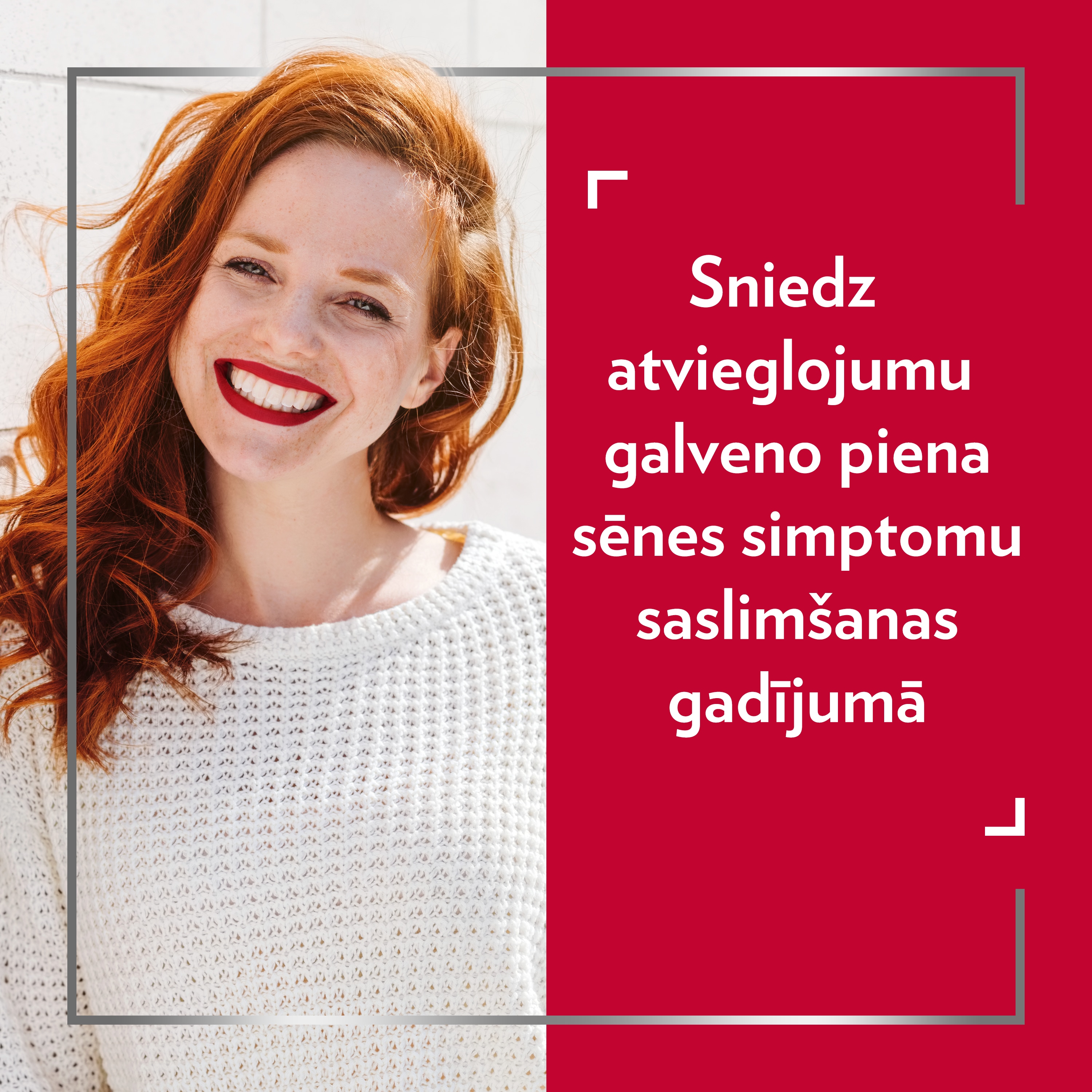Smaidoša rudmataina sieviete